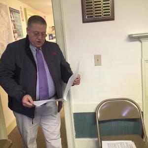 Lincoln County Sheriff Todd Brackett looks over an early draft of possible fireworks rules in Alna, at the April 6 selectmen’s meeting. SUSAN JOHNS/Wiscasset Newspaper