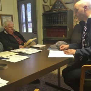 Alna First Selectman David Abbott, left, and Third Selectman Doug Baston hear from Fred Brewer of William H. Brewer & Co. on May 4. SUSAN JOHNS/Wiscasset Newspaper