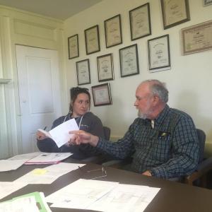Alna Second Selectman Melissa Spinney, left, and First Selectman David Abbott take part in the board’s May 18 meeting at the town office. SUSAN JOHNS/Wiscasset Newspaper