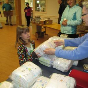 Diaper distribution at the Ecumenical Food Pantry in Newcastle. Courtesy of Sue Rockwood