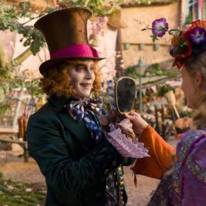 Johnny Depp (The Mad Hatter) and Mia Wasikowska (Alice) in a scene from "Alice Thru the Looking Glass,"playing at The Harbor Theatre, Boothbay Harbor.