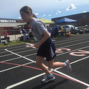 Boothbay Region Elementary School sixth grader Gracie Giles starts a race on the Wiscasset Middle High School track, setting for a regional Special Olympics track and field event May 20. SUSAN JOHNS/Wiscasset Newspaper