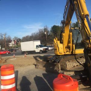 Equipment and barrels occupy the municipal building corner of the routes 1 and 27 intersection in Wiscasset April 29. SUSAN JOHNS/Wiscasset Newspaper