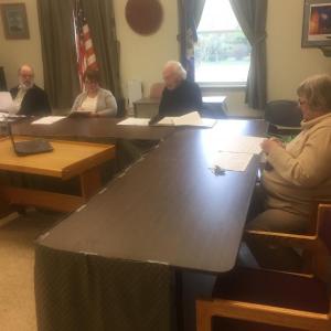 Wiscasset Historic Preservation Commission members, from left, Gordon Kontrath, Wendy Donovan, John Reinhardt and Susan Blagden, take part in the panel’s May 16 meeting at the municipal building. Member Jib Fowles attended via Skype on the open laptop. SUSAN JOHNS/Wiscasset Newspaper