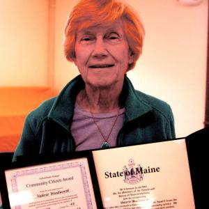 Valerie Woodworth displays her Community Citizen Award certificates. ART MAYERS/Wiscasset Newspaper