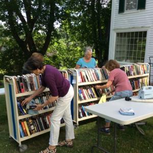 Members of the Friends of the Library clean books and get ready to move into the newly remodeled Used Book Room. Courtesy photo