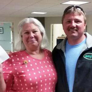 Kevin Busch, of Maine Energy Performance Solutions, was the first to deliver a check to Lynn Norgang, executive director of The Lincoln Home to help support The Lobster & More event. Courtesy photo