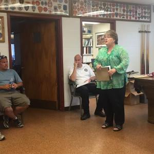 Wiscasset Town Manager Marian Anderson meets with firefighters at the station July 6. SUSAN JOHNS/Wiscasset Newspaper