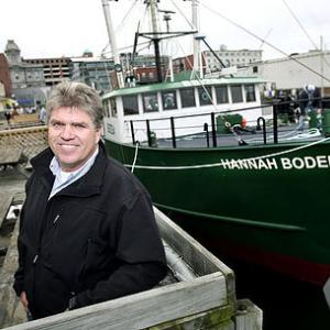 Westport Island’s Jon Williams with the Hannah Boden, owned by his Atlantic Red Crab Company. Courtesy of atlanticredcrab.com