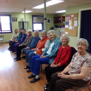 Hearts Ever Young chair tap dancers rehearsing at Spectrum Generations (front to back): Carolyn Gray, Lila Blechman, Anne Guild, Tish Meyers, June Bourne, Melba Boynton, Gianina Ames, Janice Sprague and Viola Glendinning. Not pictured is Peggy Gaglione. Courtesy of Carol Teel Hearts Ever Young