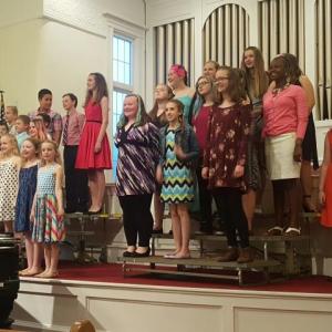 Fourth through eighth graders from Boothbay Region Elementary School sing during a chorus concert held June 1 at the Congregational Church of Boothbay Harbor. STEVE EDWARDS/Boothbay Register