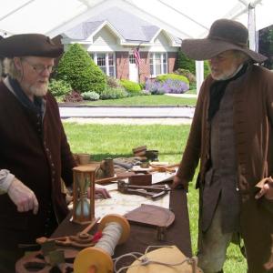 Jeff Miller and Paul Daiute discussing maps, charts and navigational instruments used during the Colonial Era. Courtesy photo