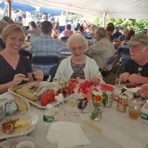 Attendees at the Lobster & More event enjoy their lobsters at The Lincoln Home Aug. 19. Courtesy photo