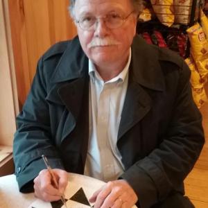 Don Carrigan of Channel Six News signs a quilt square that is now part of the Chapman-Hall House Signature Quilt. Courtesy photo