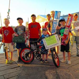 Youth door prize drawing winners of the Boothbay Region Fish & Game Association’s 13th annual Saltwater Fishing Tourney from left: Joe Gray, Danny Gray, Andrew Meader, Owen Holt, Tommy Gray. Jack Kaler, Jake Kelley and the bike winner Everett Kaler. Stephen Rubicam photo Stephen Rubicam photo