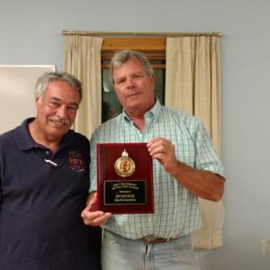 Alna Assistant Fire Chief Roger Whitney, left, presents the Lincoln County Fire Chiefs Association’s firefighter of the year award to fellow Alna resident Jeff Whittemore Aug. 16. Courtesy of C. Stewart Rhine, Alna Fire Department