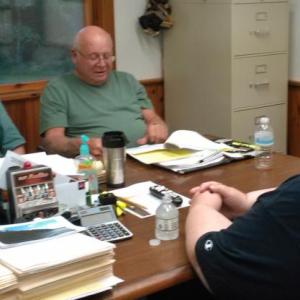Dennis Cromwell, right, president of G & D Cromwell, discusses Westport Island’s snow plowing agreement with selectmen George Richardson, left, and Jerry Bodmer prior to their meeting Monday, Aug. 14. JANE CARPENTER/Wiscasset Newspaper.