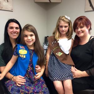 From left, Kelly Tochterman, daughter Presley, Emma Bailey and her mother Desiree Bailey, all of Wiscasset pose Sept. 21 after talking about the Sept. 30 Girl Scouts bottle drive that will be part of Possibilities Salon’s open house-community block party. Presley still wears her Daisy’s vest while awaiting the brown sash of her new status as a Brownie. SUSAN JOHNS/Wiscasset Newspaper