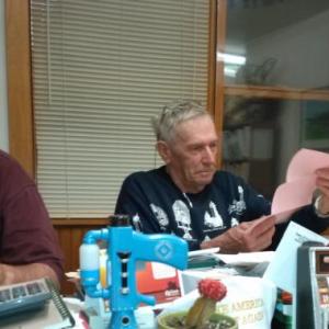 Westport Island selectmen, from left, Ross Norton, George Richardson and Jerry Bodmer review bids for the town hall painting project. JANE CARPENTER/Wiscasset Newspaper