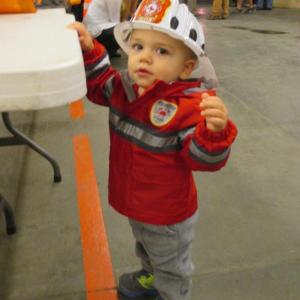 Spencer Grover, 15 months, son of Nicholas and Cassey Grover of Wiscasset, enjoyed himself at the Wiscasset Fire Department’s annual open house Oct. 11. PHIL DI VECE/Wiscasset Newspaper