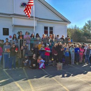 Wiscasset Middle High School seventh and eighth graders pose outside Church of the Nazarene in Wiscasset. Courtesy of Deb Pooler