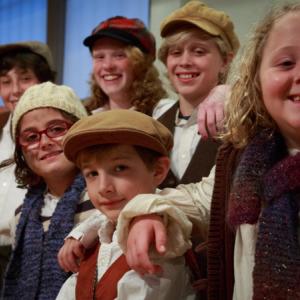 Street urchins steal the show with song and dance in theatrical production of “Scrooge!” From left, front row: Sadie Daniels, Ethan McDonald, Evelyn Ringrose. From left, back row: Isaac Ensel, Samantha Melquist, Cayden Green. Show dates are Dec. 14-17. Courtesy of Jennifer DeChant “Scrooge!” Chocolate Church Arts Center cast