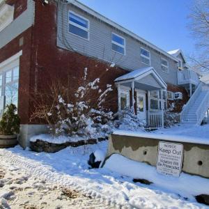 The state recently posted signs on the Haggett building and placed barriers in front of the parking lot to deter trespassing at 38 Water St. PHIL DI VECE/Wiscasset Newspaper