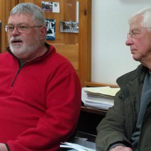 Tom Cromwell, left, presents his request for a property tax abatement to Westport Island selectmen as William Cooney, right, listens. JANE CARPENTER/Wiscasset Newspaper
