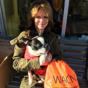Debbie Gagnon and her rescue pup, Daisy Duke, with a pet oxygen mask kit for the Edgecomb Fire Department. SUZI THAYER/ Boothbay Register