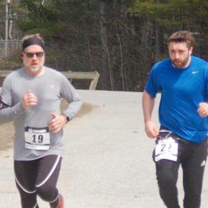 Father and son runners Stephen and Layne Graffam finish the race together. ART MAYERS/Wiscasset Newspaper