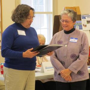 WACC President Dr. Jean Beattie Flynn presents the Chamber’s lifetime achievement award to Nancy Roby. PHIL DI VECE/Wiscasset Newspaper