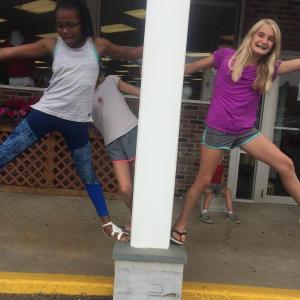 Nora Conlin of Boothbay, right, and “twin sister” Ree Robinson of New York City waiting for the trolley in Boothbay Harbor last July. Courtesy of Eve Jamieson