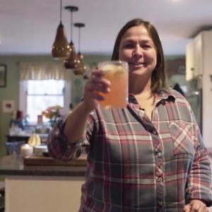 Lisa Hallinan raises a glass of her favorite pink cocktail, a pomegranate margarita, to her adoring fans. Courtesy of Maine Spirits