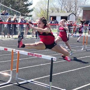 Ayanna Stover competes in the girls 3 by 60-meter shuttle hurdle. Courtesy of Josiah Winchenbach