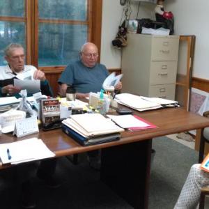 Bailey Bartlett, right, discusses mural art for the sand and salt shed with Westport Island selectmen. JANE CARPENTER//Wiscasset Newspaper