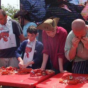 One, two, three .. GO! And they did! The 56th Windjammer Days Festival’s annual lobster-eating contest was crackin’ good fun! LISA KRISTOFF/Boothbay Register