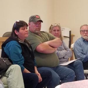 Dresden resident Sonia Lilly urges selectmen to “come back together” with the fire department so they can both move forward. Her husband, Fire Chief Steve Lilly, looks on. KATRINA RICKERMANN/Wiscasset Newspaper