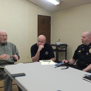 Public Safety Advisory Committee member John Reinhardt discusses the importance of having local public safety agencies with Wiscasset Ambulance Director Toby Martin and Police Chief Jeff Lange. GINA HAMILTON/Wiscasset Newspaper