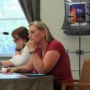 Pam Logan, new member of the Wiscasset Historic Preservation Commission, considers a COA request June 21. GINA HAMILTON/Wiscasset Newspaper