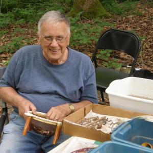 A participant in DRA’s Archaeology Field School sorts through artifacts found at the Hatch Homestead site in Newcastle. Courtesy of DRA