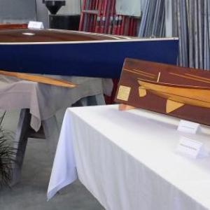 Mounted hull models and a model kayak display at an Arts and Yachts event of the past. LISA KRISTOFF/Boothbay Register
