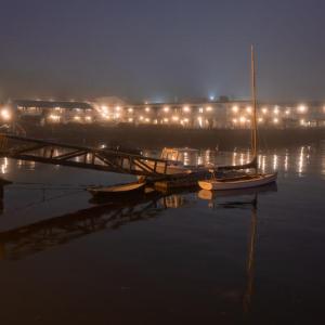 A foggy night image taken from the footbridge in Boothbay Harbor. Mike Leonard photo