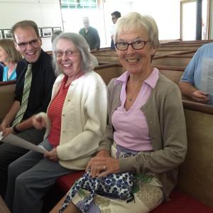 From left, First Congregational Church of Wiscasset pastor Josh Fitterling and members Lous Sheils and Jan Whitfield await the start of Roger Whitney's demonstration of the 1894 organ at Alna's Head Tide Church July 15. SUSAN JOHNS/Wiscasset Newspaper