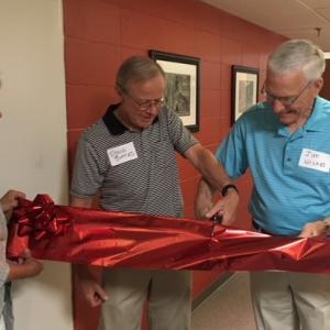 The ribbon is cut, and Midcoast Senior College is open at its new location on Brunswick Landing. This fall 27 courses for seniors will range from arts to science and more. From left are Donna Marshall, executive director; Douglas Bates, vice president; and James Wilkes, president. Courtesy photo