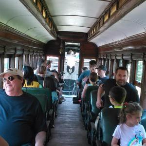 Passengers enjoy a ride aboard the WW&F narrow gauge railway en route to the ice cream social. JANE CARPENTER/Wiscasset Newspaper