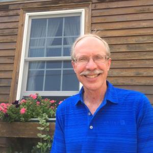 Steve Whitfield at home on Water Street Aug. 3, a day after his last day at the office as a Lewiston principal. SUSAN JOHNS/Wiscasset Newspaper