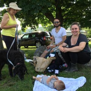 Clockwise from left, Wendy Schlotterbeck with her labradoodle Lola, Sebastian Ponce, Hannah Schlotterbeck, and Hannah's and Sebastian's 11-week-old, Rafael, enjoy lunch on
Wiscasset's waterfront Aug. 5. SUSAN JOHNS/Wiscasset Newspaper