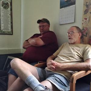 Alna Fire Chief Mike Trask, left, and fellow resident Chris Cooper attend selectmen's Aug. 8 meeting at the town office. SUSAN JOHNS/Wiscasset Newspaper