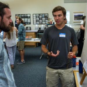 Nick Houseman, right, a senior at the University of Rhode Island, studied the potential impact of ocean acidification on shellfish at the Darling Maine Center with Damian Brady. He presented his findings at the SEA Fellows Symposium last month. Courtesy of DMC