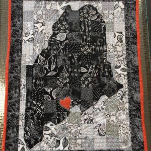 The map of Maine quilt is called “Home is Where My Heart Is” by Beth Ditkoff. Courtesy photo